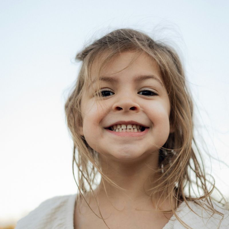 Why I Almost Never Say "Smile" — The Case for Candid Photography